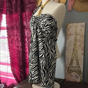 Chic Zebra Print swimsuit with gold cord.